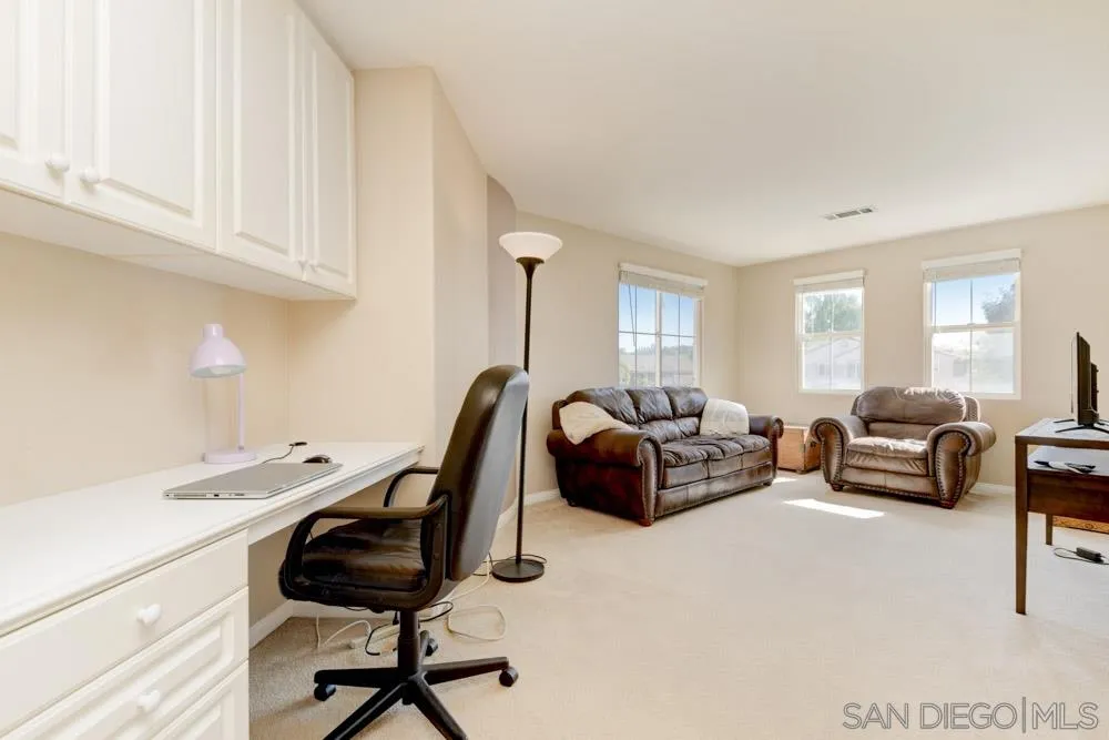 3224 Rancho Arroba Carlsbad, CA 92009 - Photo 25 of 35 a view of a workspace with furniture and a window