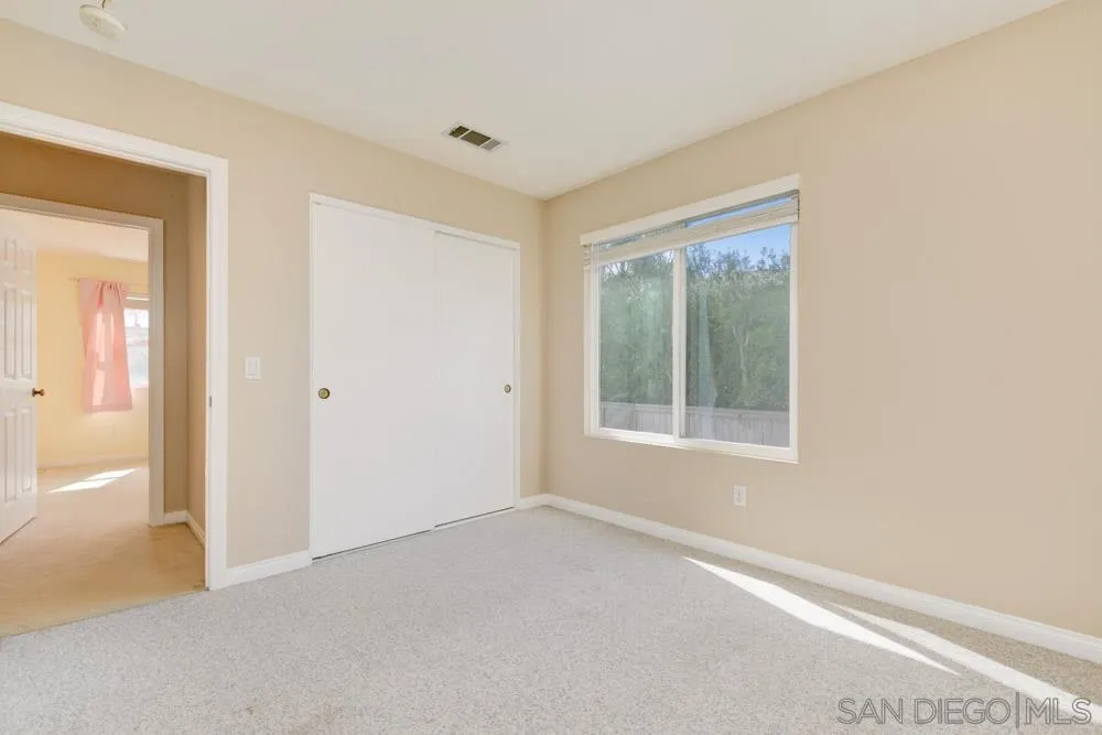 3224 Rancho Arroba Carlsbad, CA 92009 - Photo 28 of 35 a view of an empty room with a window