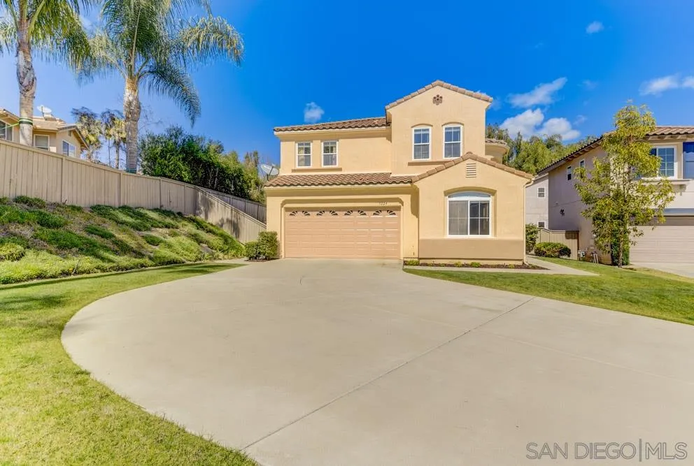 3224 Rancho Arroba Carlsbad, CA 92009 - Photo 3 of 35 a view of a white house with a yard