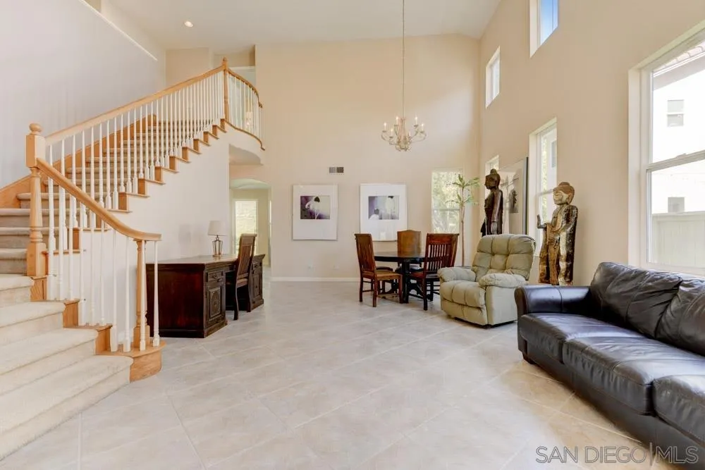 3224 Rancho Arroba Carlsbad, CA 92009 - Photo 6 of 35 a living room with furniture and wooden floor