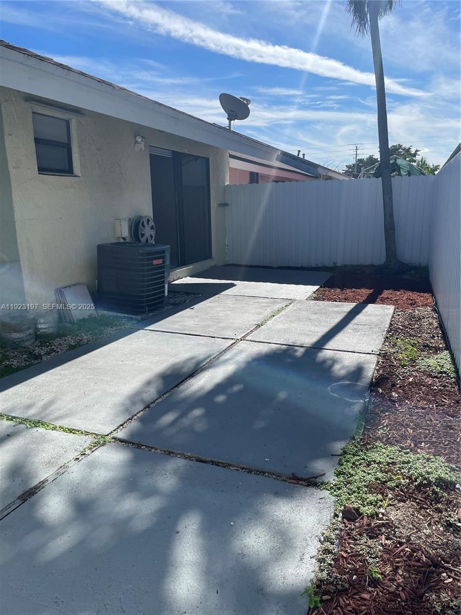 5216 West 24th Way, Unit 17D Hialeah, FL 33016 - Photo 14 of 14 a view of a backyard of a house