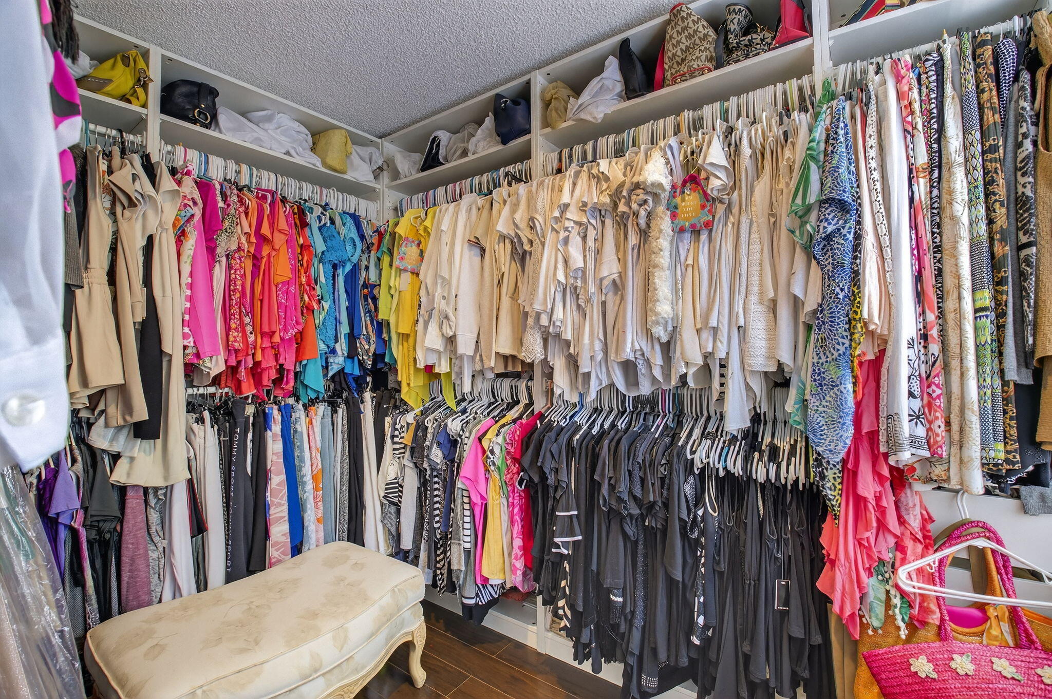 10570 Bexley Boulevard Boca Raton, FL 33428 - Photo 14 of 37 a view of walk in closet with clothes