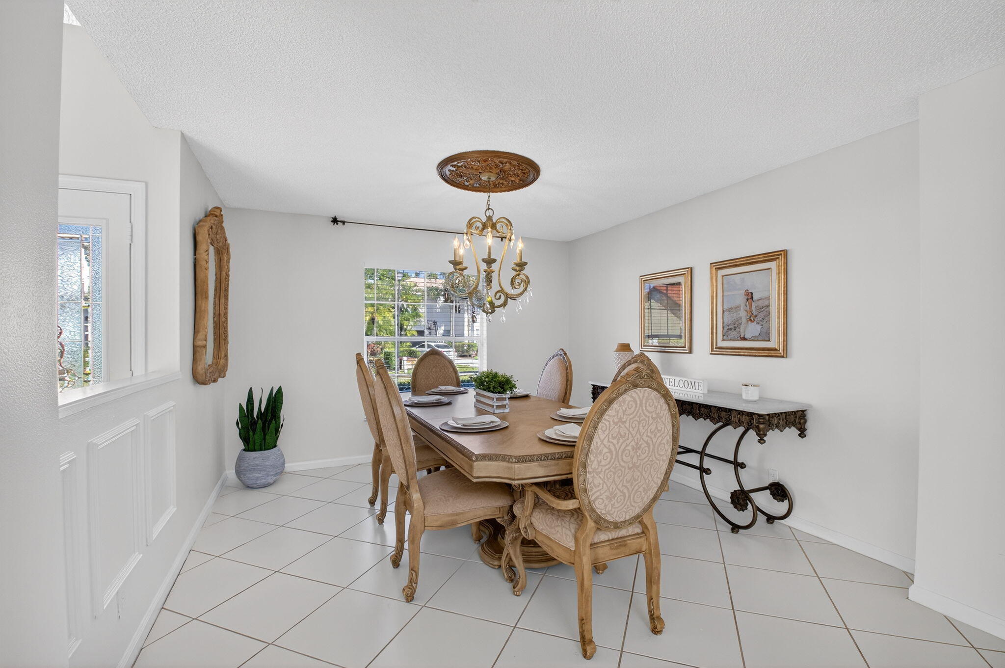 10570 Bexley Boulevard Boca Raton, FL 33428 - Photo 6 of 37 a view of a dining room with furniture
