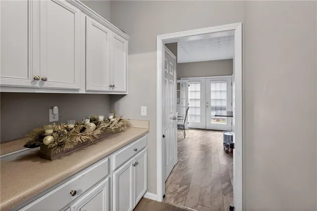 a kitchen with a sink and cabinets