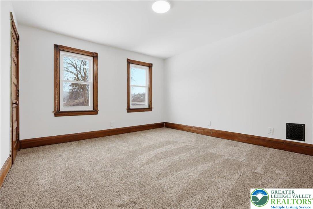 524 Fiot Street Bethlehem, PA 18015 - Photo 27 of 42 a view of an empty room with windows