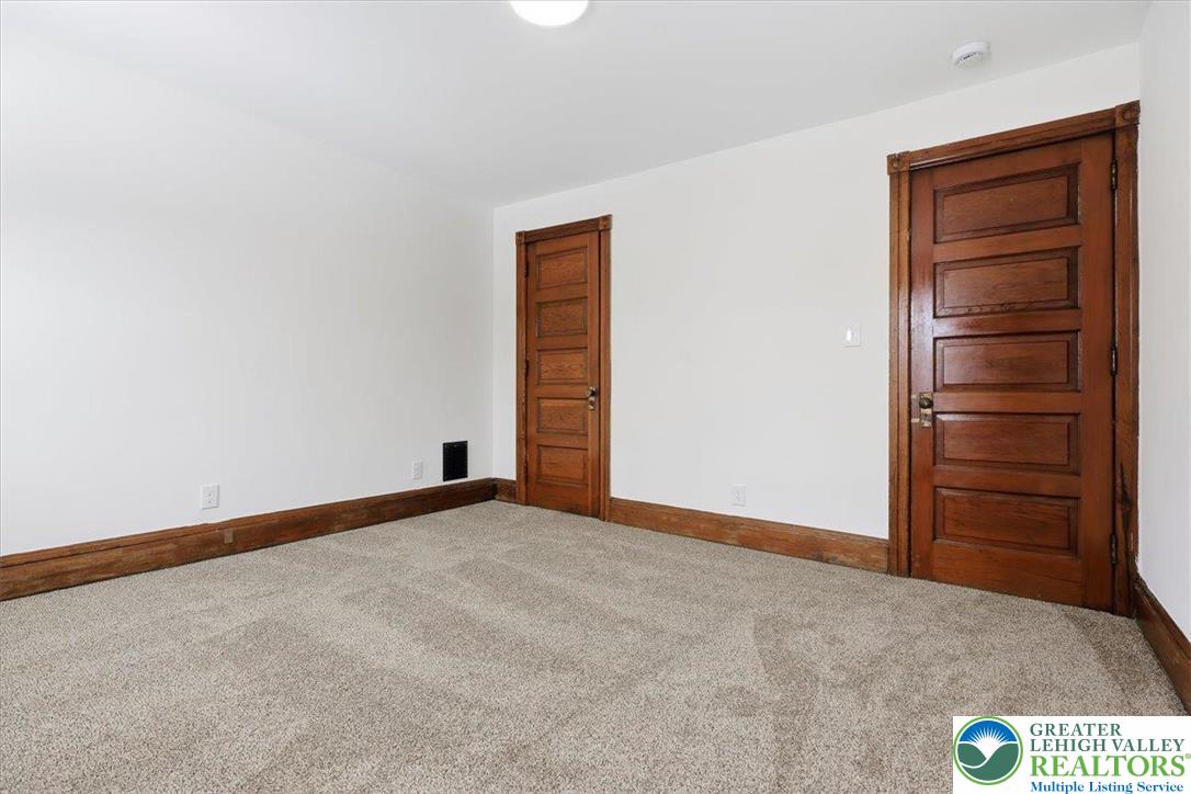 524 Fiot Street Bethlehem, PA 18015 - Photo 29 of 42 an empty room with closet and cabinet