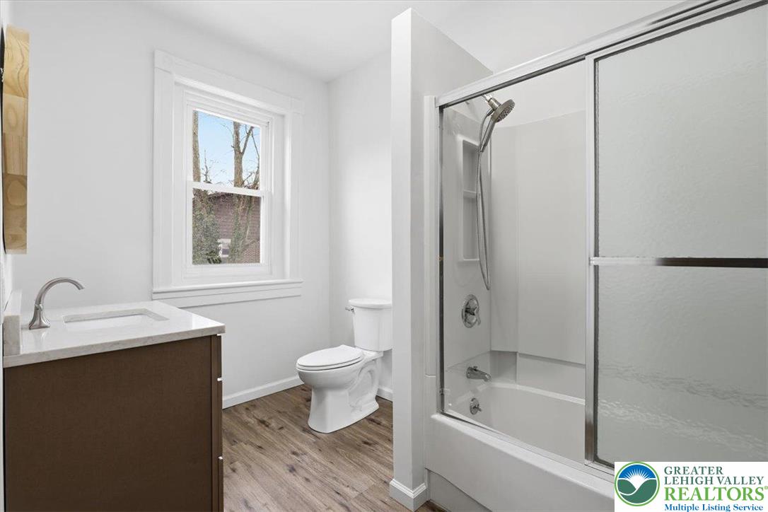 524 Fiot Street Bethlehem, PA 18015 - Photo 32 of 42 a bathroom with a bathtub shower sink vanity and toilet