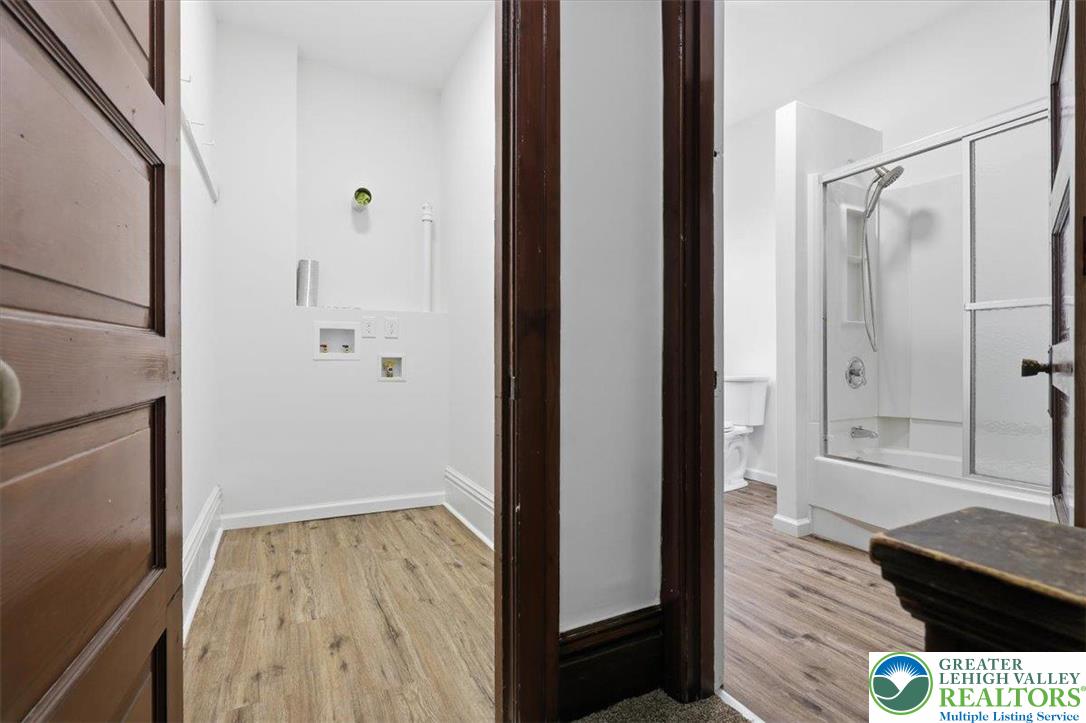 524 Fiot Street Bethlehem, PA 18015 - Photo 34 of 42 a view of bathroom with bathtub and wooden floor