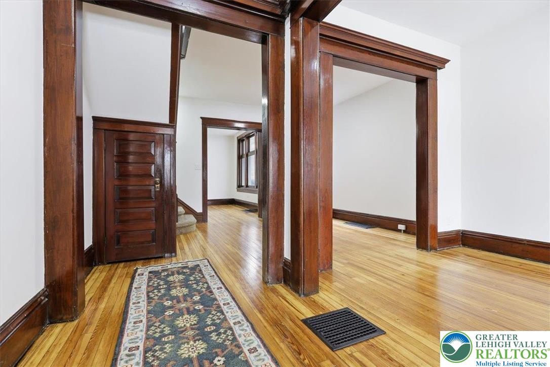 524 Fiot Street Bethlehem, PA 18015 - Photo 4 of 42 a view of hallway with wooden floor and stairs