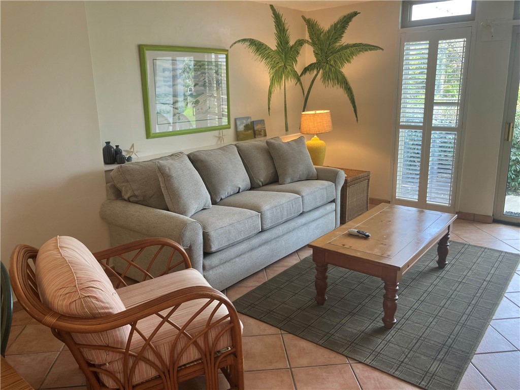 1175 North Beachview Drive North, Unit 105 Jekyll Island, GA 31527 - Photo 3 of 15 Living room w/new couch