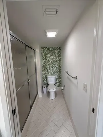 a bathroom with a sink and toilet