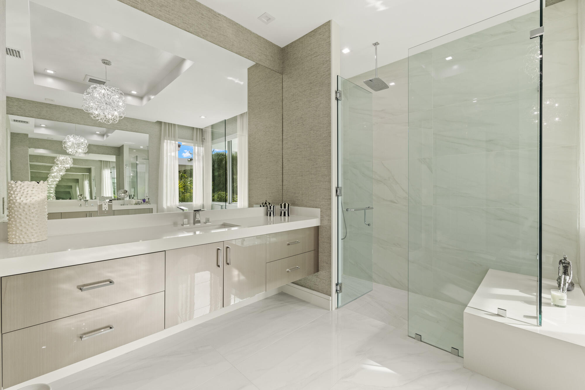 402 Ocean One Lane Juno Beach, FL 33408 - Photo 15 of 45 a bathroom with a double vanity sink mirror and shower