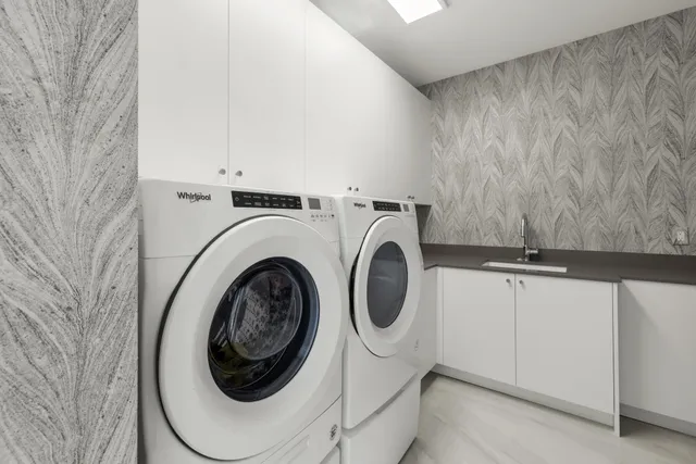 a utility room with dryer and washer