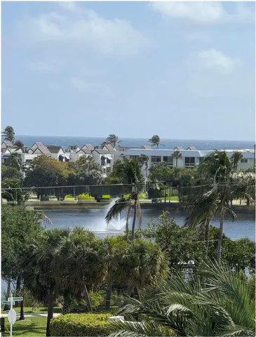 a view of swimming pool with a yard