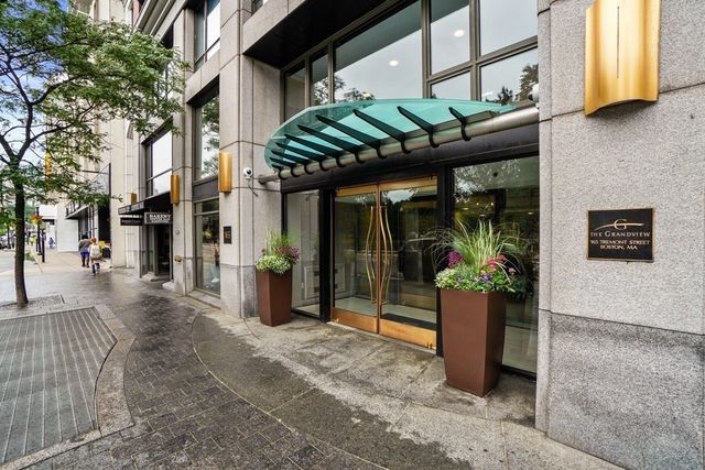 a view of street with sitting area