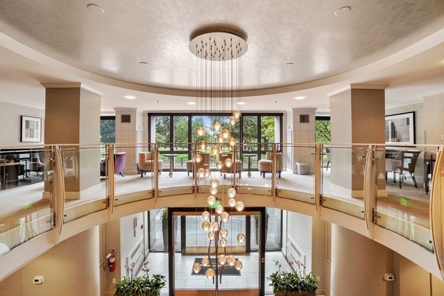a view of a living room and dining room