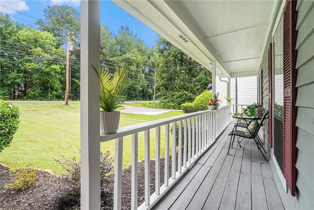 2247 Cruse Road Northwest Lawrenceville, GA 30044 - Photo 2 of 16 a view of balcony with wooden floor