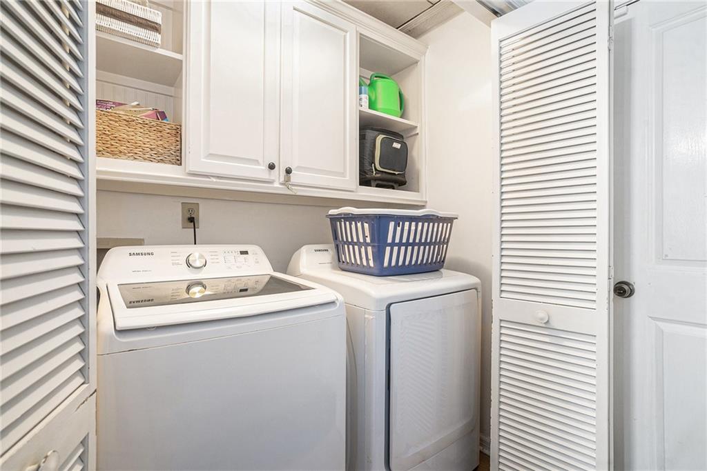 2247 Cruse Road Northwest Lawrenceville, GA 30044 - Photo 10 of 16 a utility room with dryer and washer