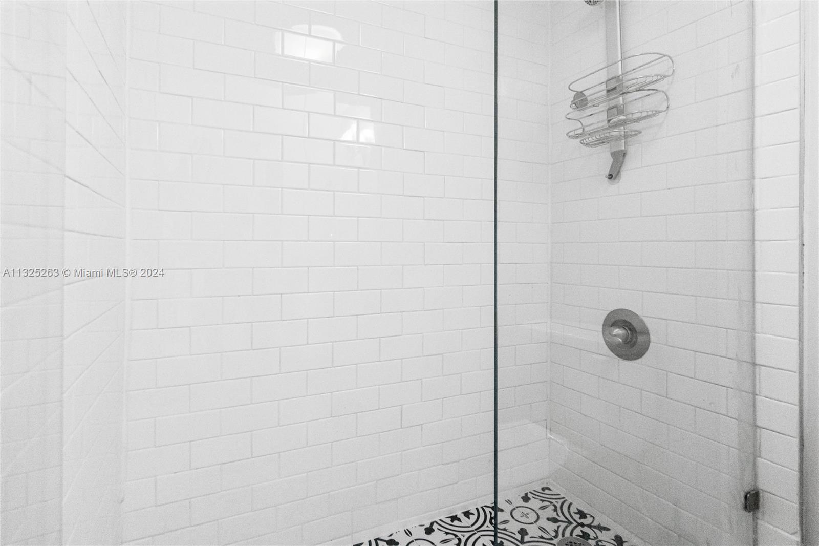 100 Lincoln Road, Unit 320 Miami Beach, FL 33139 - Photo 13 of 23 a bathroom with a shower