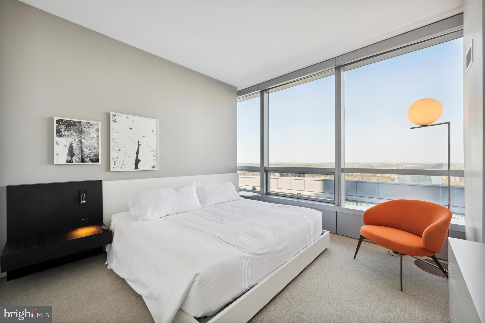 2930 Walnut Street, Unit 3613 Philadelphia, PA 19104 - Photo 23 of 33 a bedroom with a bed and large window