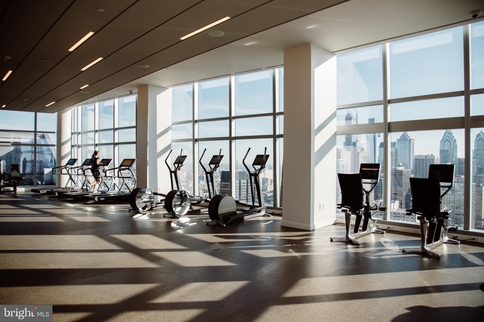 2930 Walnut Street, Unit 3613 Philadelphia, PA 19104 - Photo 32 of 33 a view of a room with gym equipment