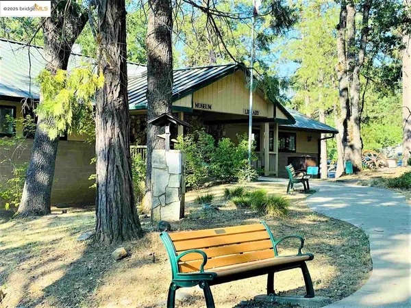 a sign broad on the side of the road