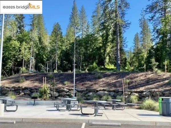 a view of swimming pool with an outdoor space and seating area