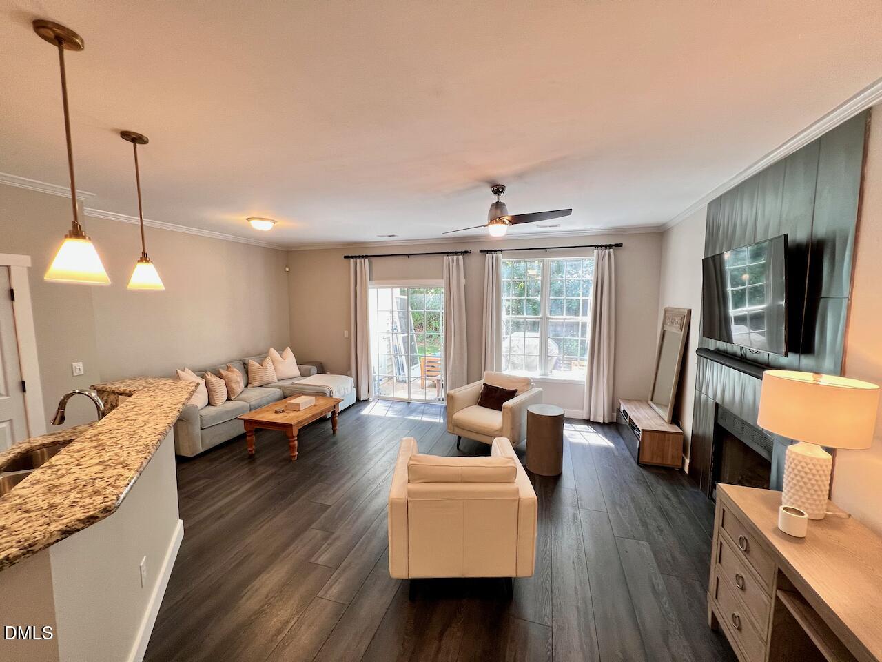 1941 Lost Lane Raleigh, NC 27603 - Photo 8 of 25 a living room with furniture and a large window