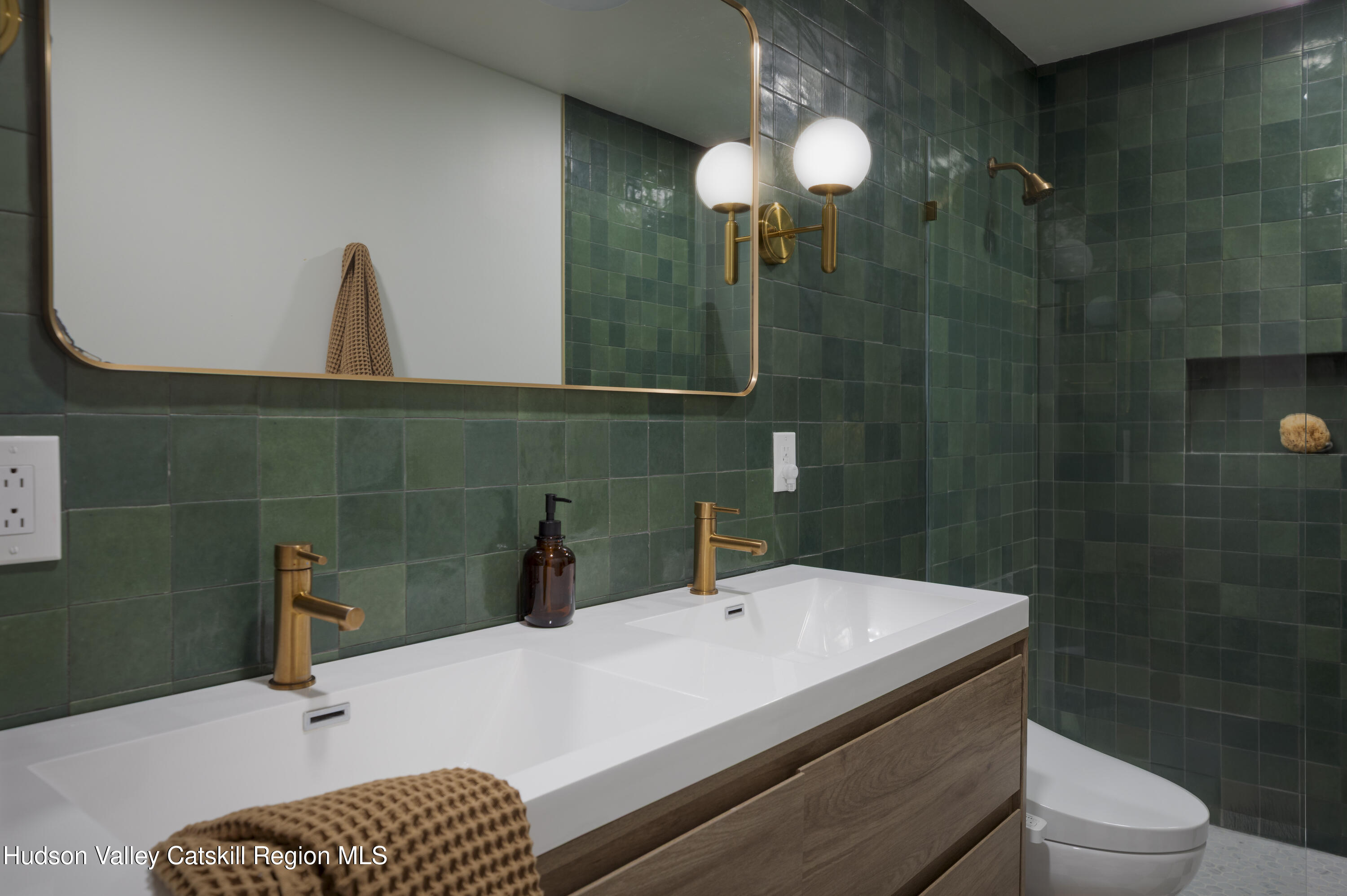 26 Krom Road Olivebridge, NY 12461 - Photo 15 of 24 a bathroom with a sink a toilet and shower