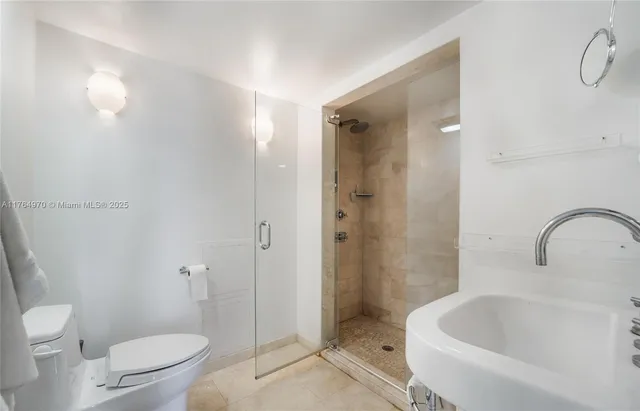 a bathroom with a toilet and a sink