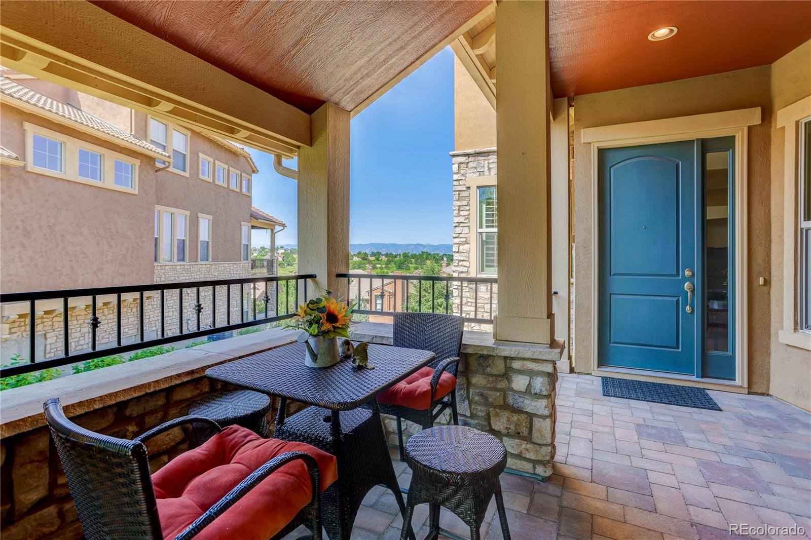 9285 Viaggio Way Highlands Ranch, CO 80126 - Photo 3 of 45 a balcony view with a seating space