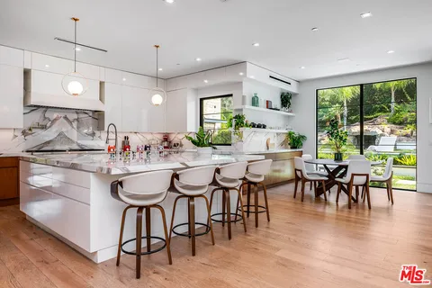 $6,495,000 | 18762 Wells Drive, Tarzana, CA 91356