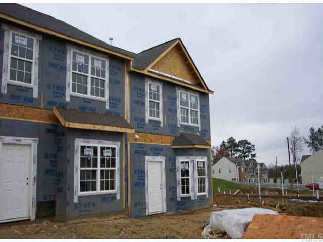 3369 Bridgeville Road Raleigh, NC 27610 - Photo 1 of 1 a view of a house with a swimming pool