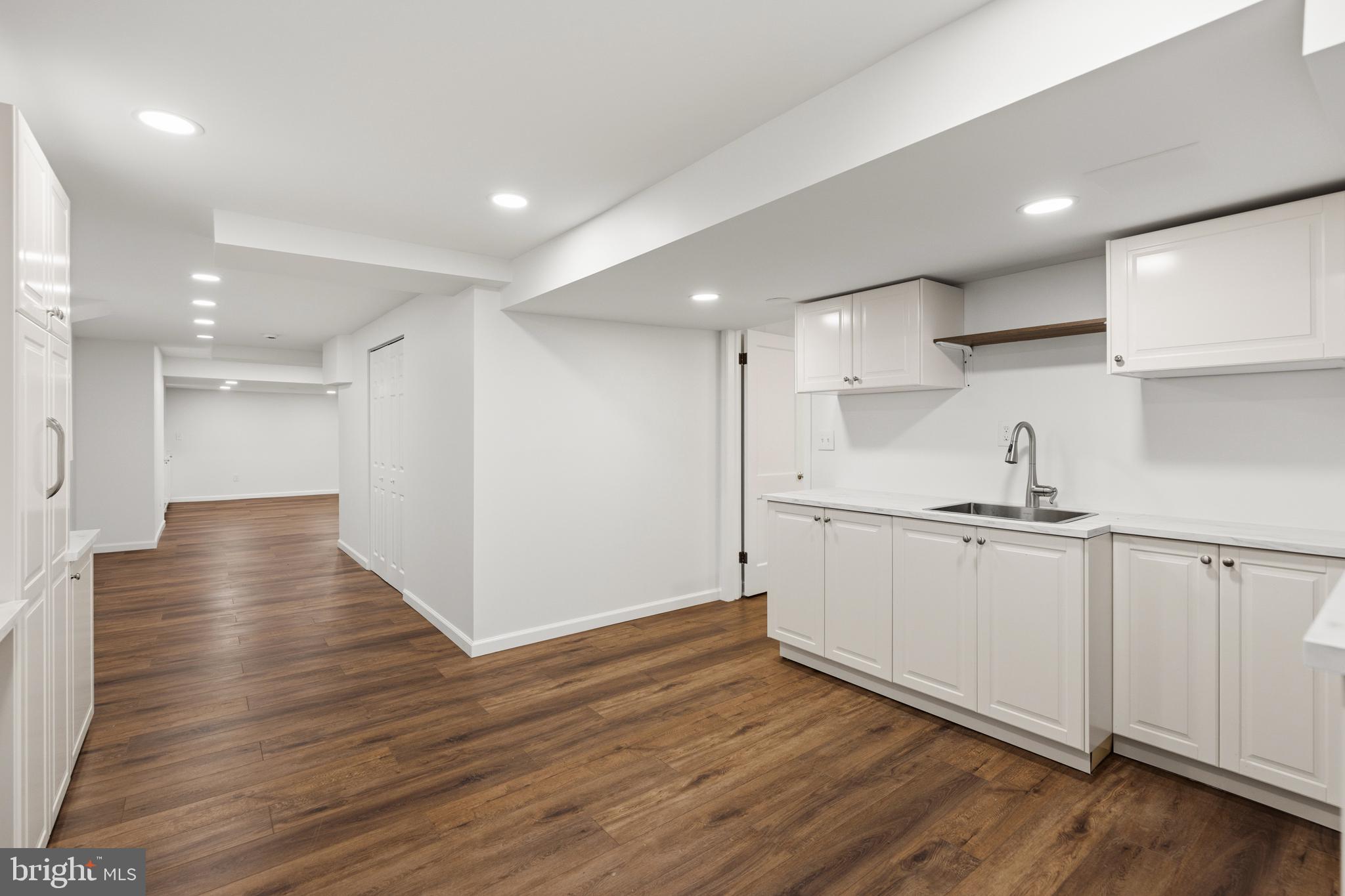 5612 Bent Branch Road Bethesda, MD 20816 - Photo 45 of 60 Laundry with sink and ample storage