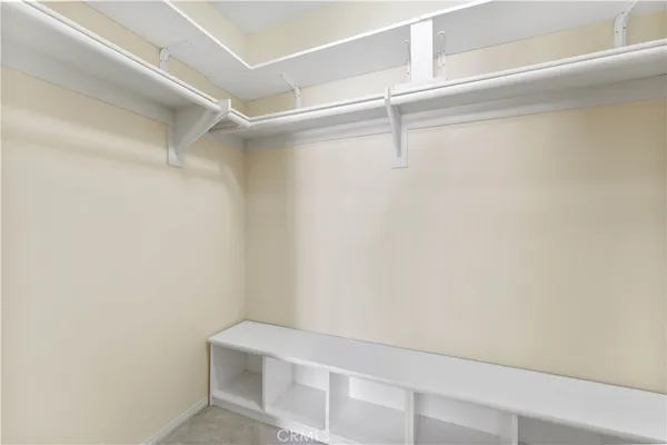 a view of an empty walk in closet