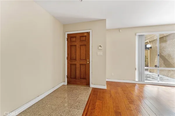 a view of an empty room and window