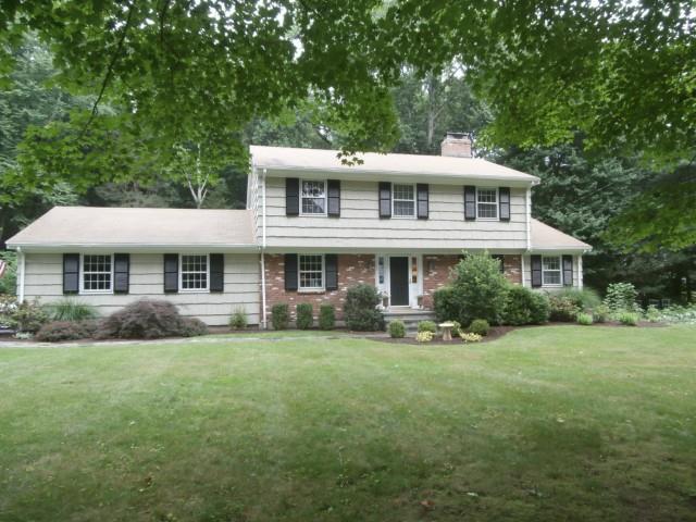 100 Delaware Road Easton, CT 06612 - Photo 1 of 1 a front view of a house with a garden