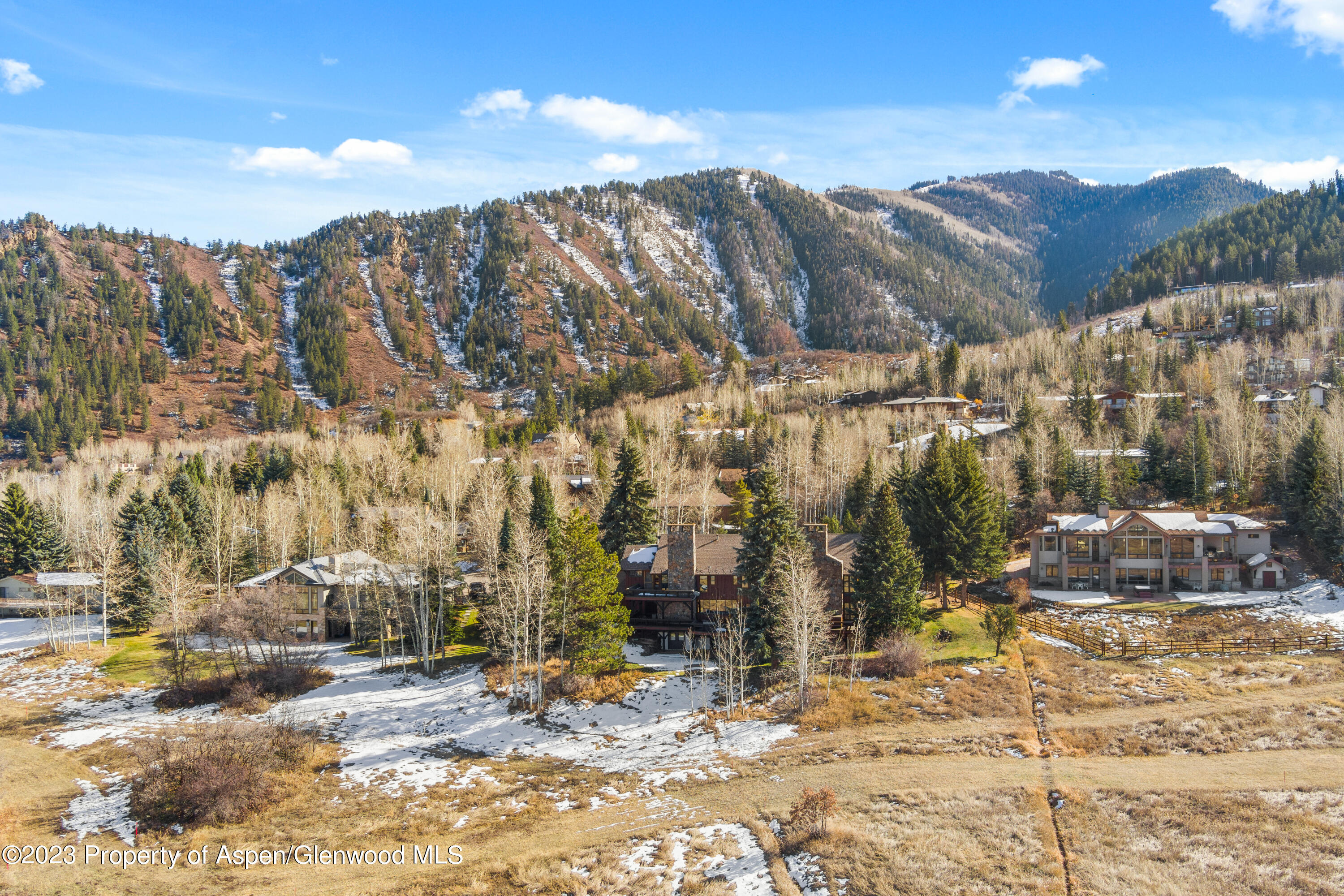 137 Primrose Path Aspen, CO 81611 - Photo 26 of 46 a view of a house with a snow in the background