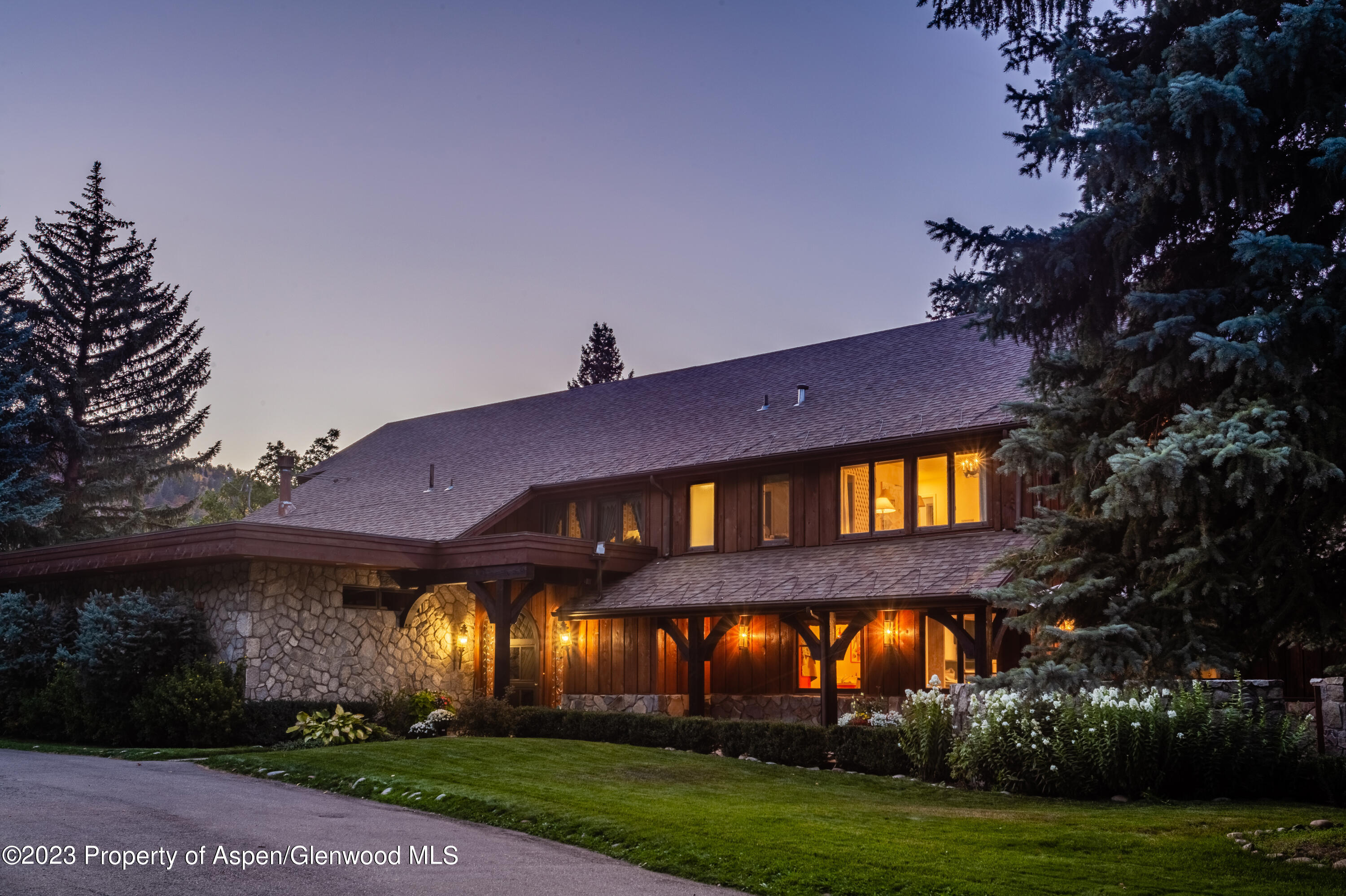 137 Primrose Path Aspen, CO 81611 - Photo 43 of 46 a front view of a house with a yard