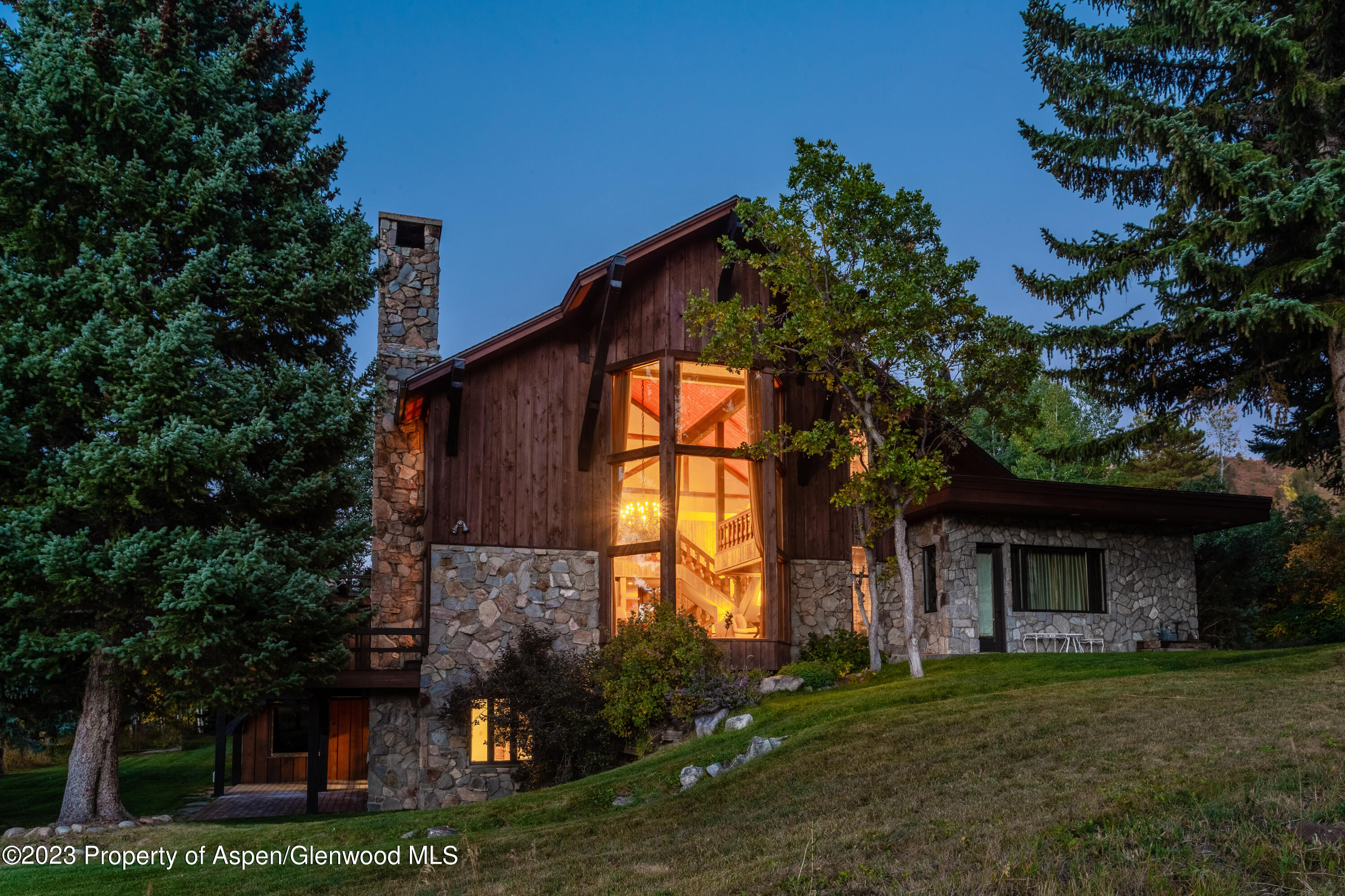 137 Primrose Path Aspen, CO 81611 - Photo 45 of 46 a house view with a garden space