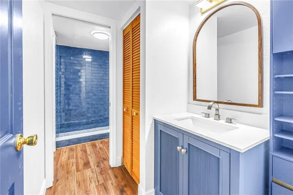 a bathroom with a sink and a mirror