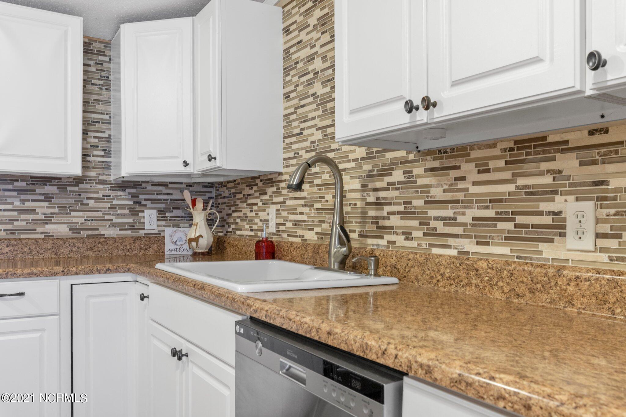 1477 Farm Life School Road Carthage, NC 28327 - Photo 14 of 32 Kitchen sink with lots of counter area.