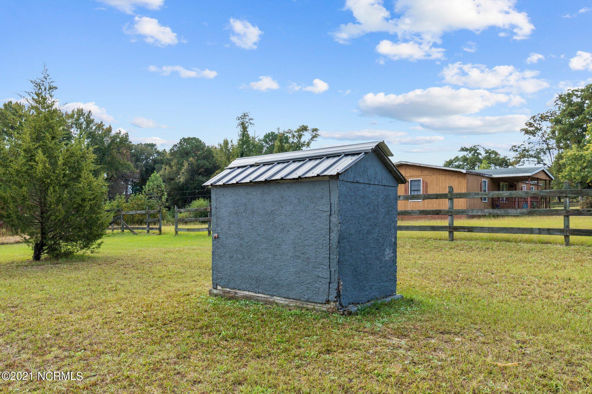 1477 Farm Life School Road Carthage, NC 28327 - Photo 26 of 32 Well house.