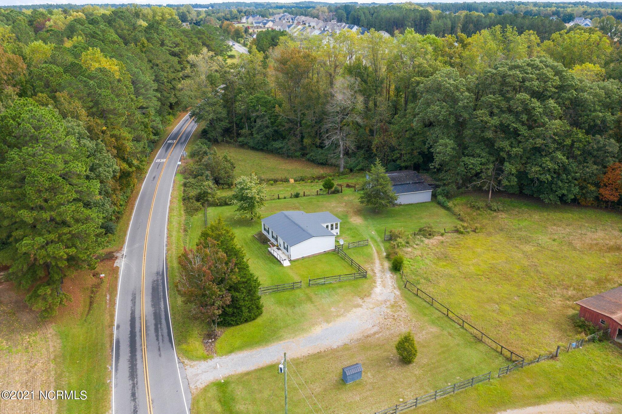 1477 Farm Life School Road Carthage, NC 28327 - Photo 5 of 32 You have more land than those that live in the nearby neighborhood!