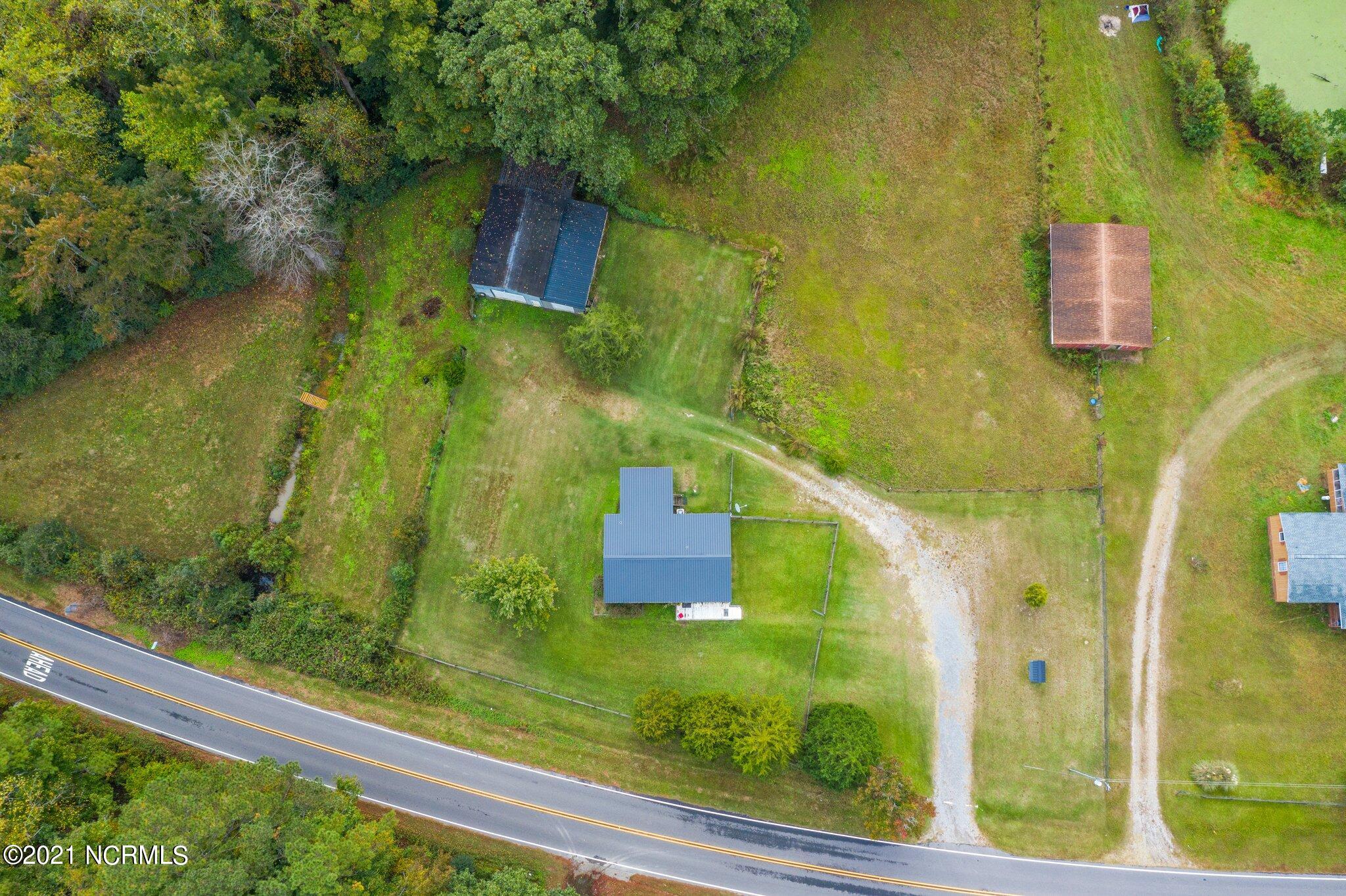 1477 Farm Life School Road Carthage, NC 28327 - Photo 7 of 32 Feels like you're far out in the county...yet just a short drive from grocery stores, schools, and major highways.