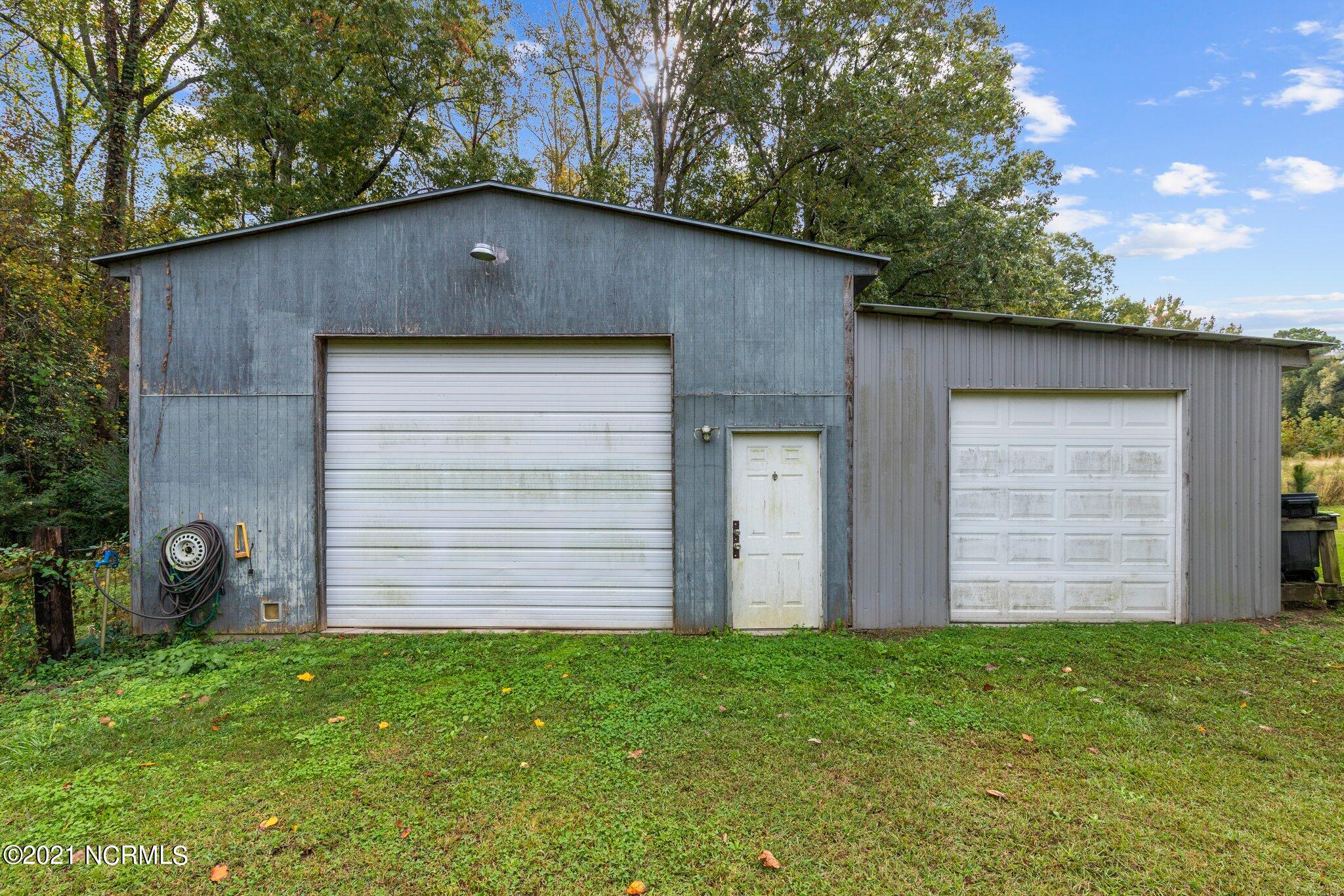 1477 Farm Life School Road Carthage, NC 28327 - Photo 8 of 32 Detached garage with workshop...get ready to enjoy!