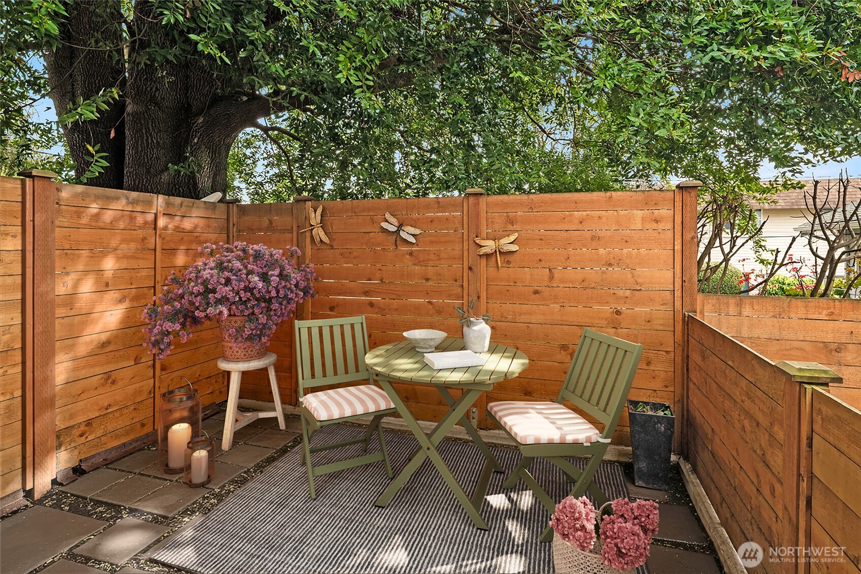 5616 California Avenue Southwest, Unit C Seattle, WA 98136 - Photo 14 of 36 a outdoor dining space with furniture and wooden floor