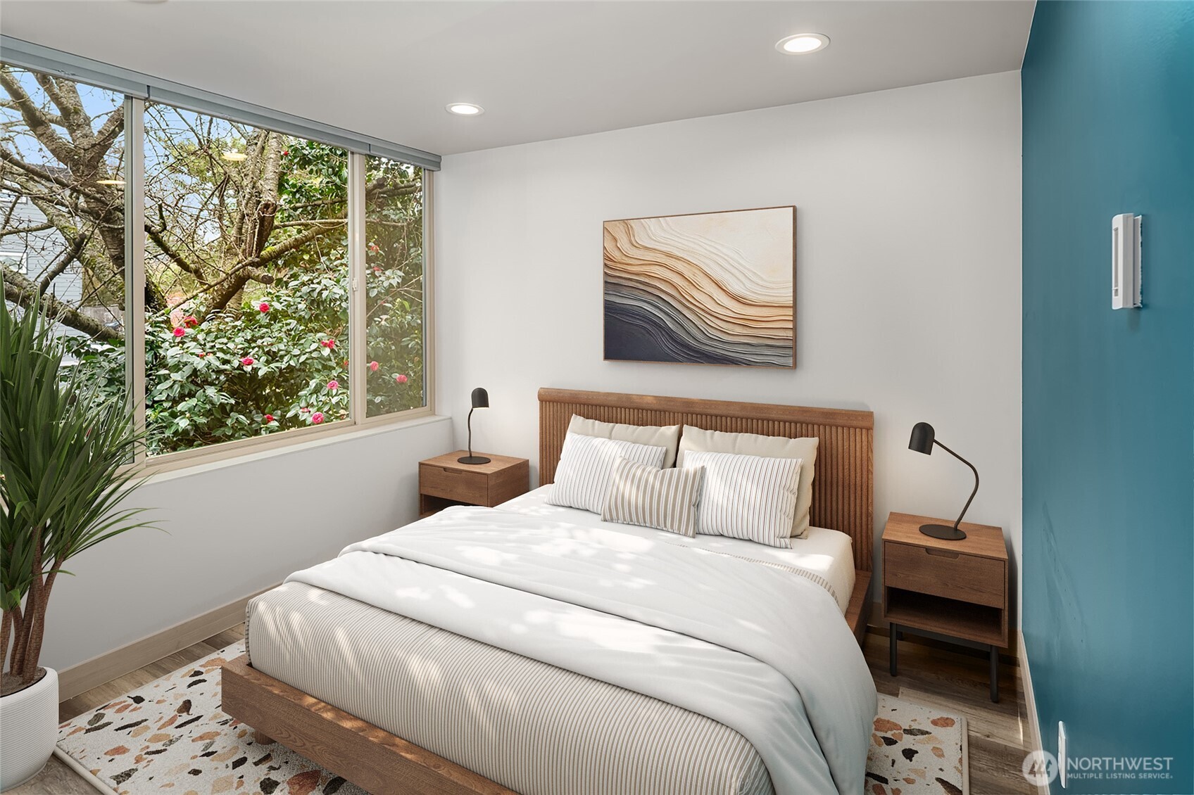 5616 California Avenue Southwest, Unit C Seattle, WA 98136 - Photo 19 of 36 a bedroom with a bed and a painting on the wall