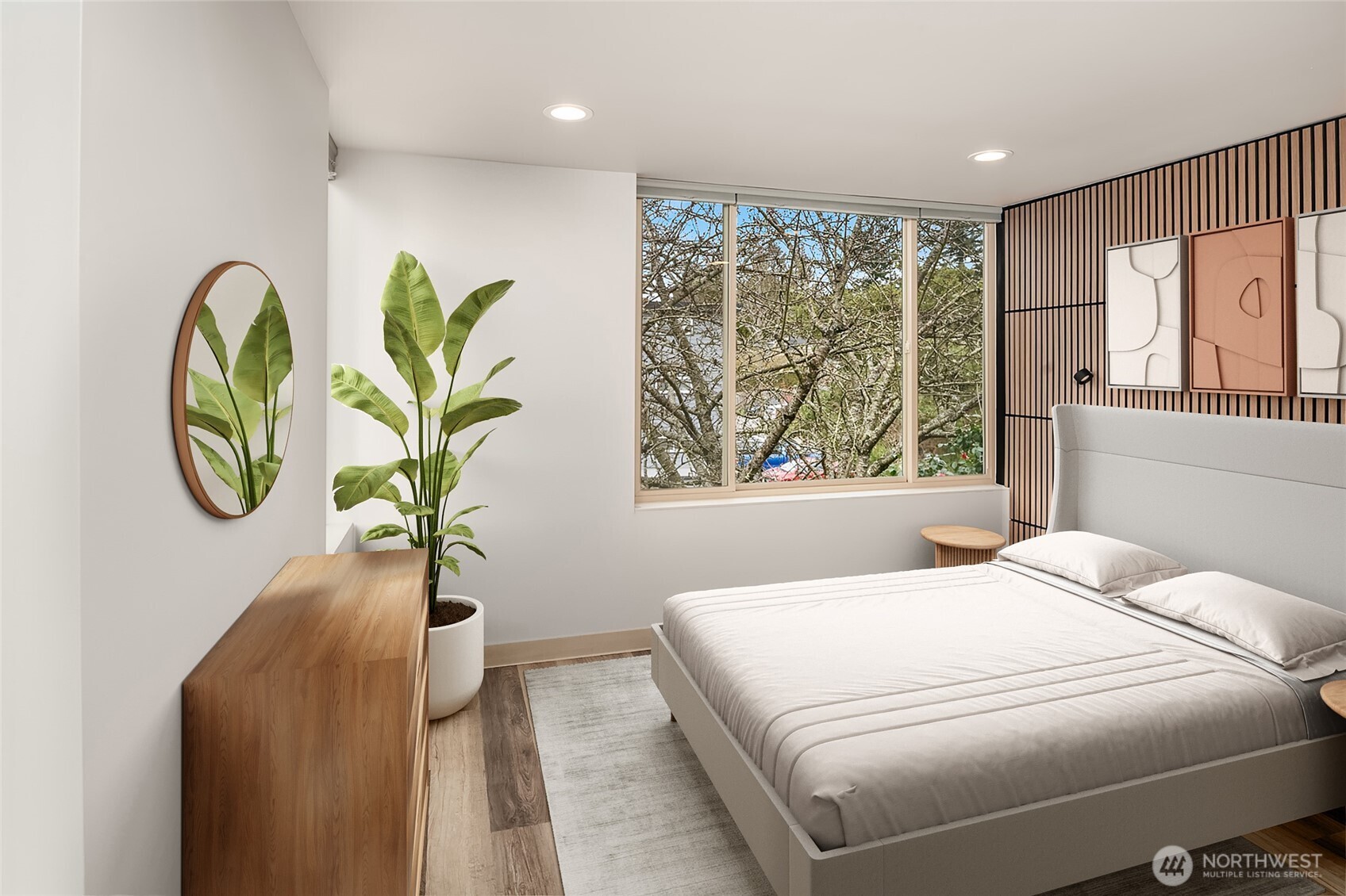 5616 California Avenue Southwest, Unit C Seattle, WA 98136 - Photo 24 of 36 a bedroom with a bed a table and with windows