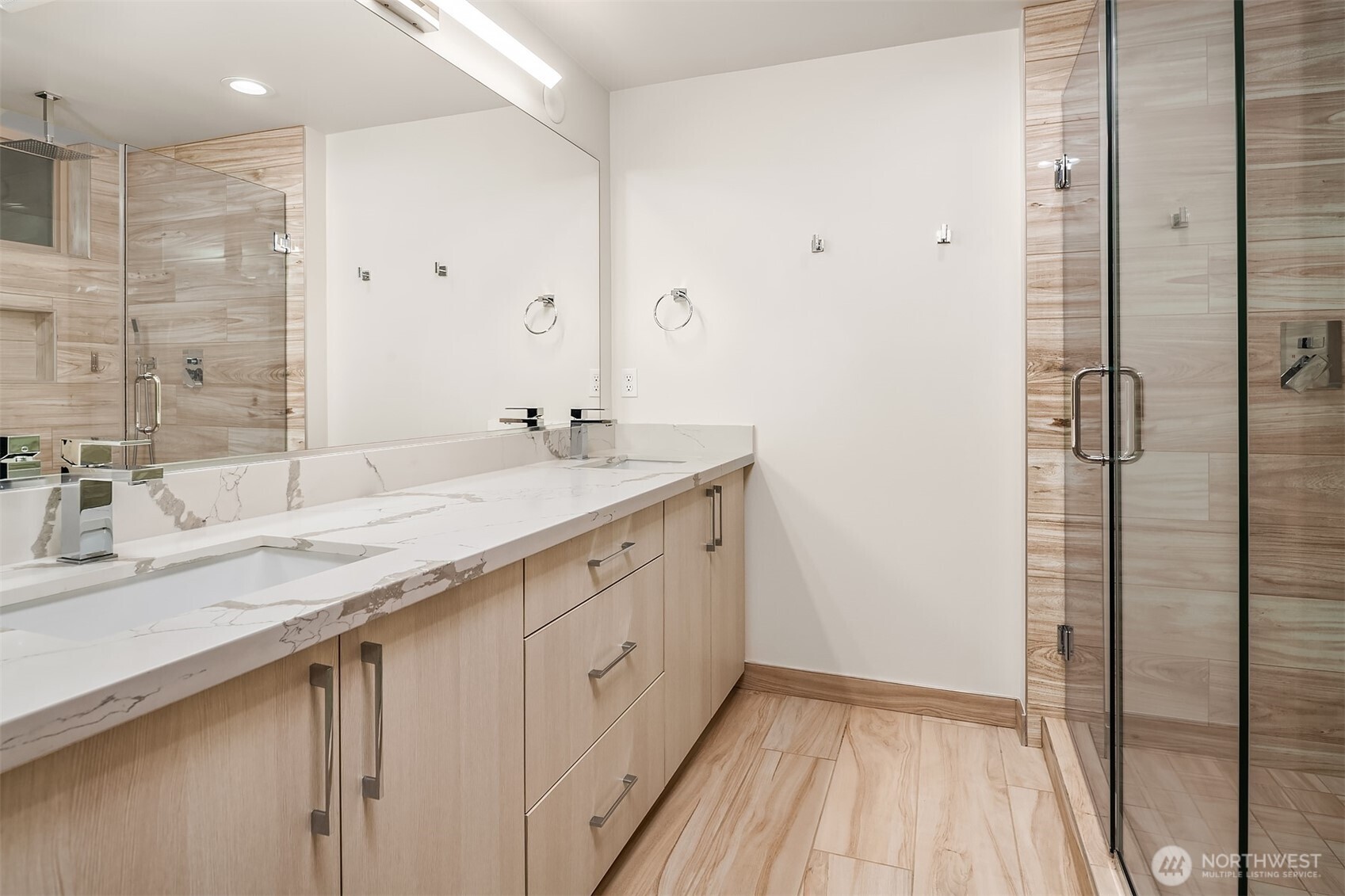 5616 California Avenue Southwest, Unit C Seattle, WA 98136 - Photo 26 of 36 a spacious bathroom with a granite countertop sink mirror and double